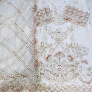 a premium white pakistani trouser with thread & stonework